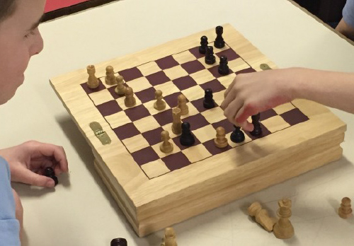 children playing chess